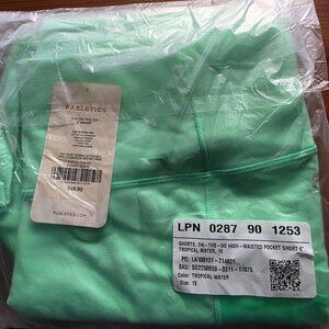 Fabletics the-on-the-go Tropical water color 6'' short XL